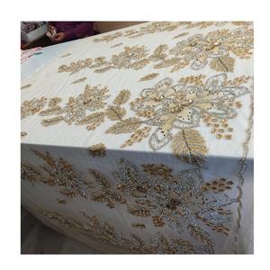 Tissu perlé de luxe pour robes de mariée et de soirée en dentelle perlée à la main disponible à un prix abordable. - Product Image 1