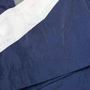 กางเกงขาสั้นกันลมกันน้ำเป็นมิตรกับสิ่งแวดล้อมสำหรับผู้ชายดีไซน์ตามสั่งผ้าโพลีเอสเตอร์แห้งเร็วสำหรับฤดูร้อน - Product Image 6