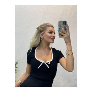 Blusa lavorata a maglia con fiocco da donna - Product Image 4
