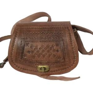 กระเป๋าหนังแท้แกะสลัก - Product Image 1