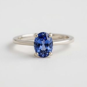 Bague de fiançailles en tanzanite en or 9 carats | Bijoux fins pour femmes | Fabricant de bagues en pierres précieuses personnalisées éthiques - Product Image 1