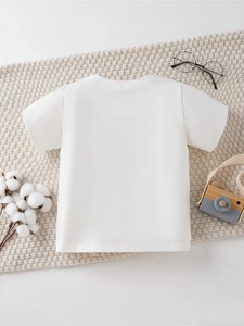 New Kid Collection Top de verano de manga corta cómodo e informal para jóvenes Blanco con diseño naranja Lavable a máquina - Product Image 2