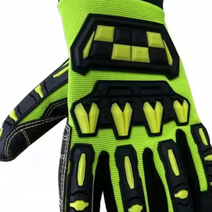 Fabriqué au <span class=keywords><strong>Pakistan</strong></span> Gants d'impact Tpr de haute qualité en cuir et caoutchouc résistants aux chocs Gants noirs/jaunes