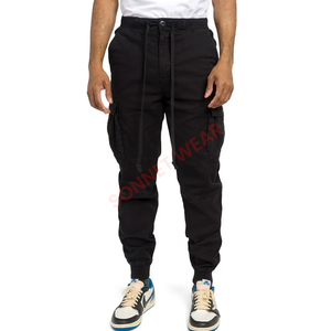 Pantalón de chándal moderno para hombre con cintura ajustable con cordón y puños acanalados, ideal para gimnasio informal y actividades al aire libre - Product Image 2