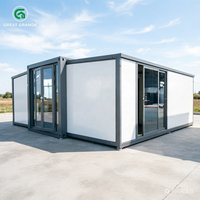 Maison conteneur extensible de luxe de 20 pieds, préfabriquée, modulaire, prête à être expédiée, avec porte latérale, salle de bain et cuisine