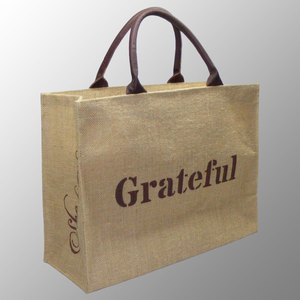 Bolsas de Yute natural con asas de cuero Bolsa de promoción de impresión personalizada Bolsillo doble Cierre de botón de imán interior Bolsas de yute de compras - Product Image 1