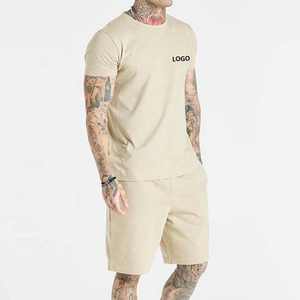 เสื้อยืดออกกำลังกายสำหรับผู้ชายเสื้อแขนสั้นผ้าคอตตอนผสมสแปนเด็กซ์โลโก้ตามสั่ง - Product Image 5