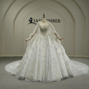 Robe de mariée moderne GT26061 à col bateau, ornée de sequins et de perles, avec traîne chapelle et dentelle florale - Product Image 1