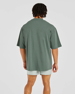 T-shirt homme surdimensionné à épaules tombantes, personnalisé avec logo, en coton mélangé respirant, idéal pour la gym et le streetwear. - Product Image 4