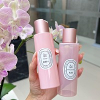 Bouteille de lavage de corps de shampooing de lotion en plastique rose vide de 100ml avec le chapeau de disque d'or rose pour l'hôtel