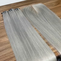 Prix de gros gris couleur os droit brut vietnamien cheveux vierges paquets de cheveux humains non transformés génie trame avec fermeture à lacet