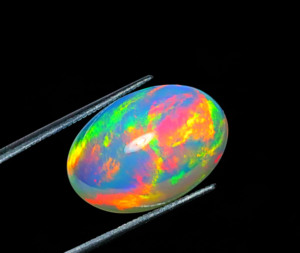 Cabochon d'opale éthiopienne pierre précieuse Welo arc-en-ciel Flashy gemmes d'opale forme ovale multi feu pierre colorée pour bijoux - Product Image 1