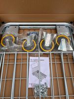 CargoMaster Pro Trolley Chariot d'entrepôt logistique de transport de marchandises industrielles à usage intensif avec cages en treillis métallique à quatre roues