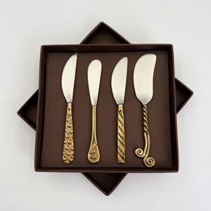 ชุดอุปกรณ์ชีสสแตนเลส 4 ชิ้น ขายดี พร้อมด้ามจับสีทอง ใบมีดสีเงิน ผลิตในอินเดีย - Product Image 1