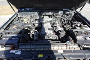 TOYOTA LAND CRUISER VX LIMITED 1996 D'OCCASION CÔTÉ GAUCHE/DROIT - Product Image 2