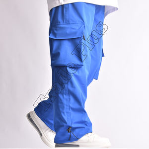 Pantalones de nieve holgados azules unisex, pantalones impermeables aislados con forro polar cálido, bolsillos de carga y parte inferior Cinch - Product Image 5