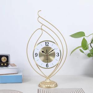 Crafted from sturdy metal this table <b>clock</b> serves as both a functional timekeeper and a decorative statement piece - Product Image 5