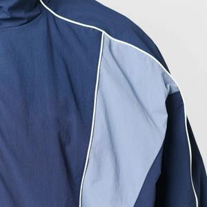 Ensemble de survêtement en nylon à deux pièces avec logo personnalisé, de haute qualité, à séchage rapide, fermeture éclair réfléchissante, survêtement léger pour hommes - Product Image 2