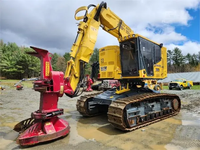 Tracteur forestier sur chenilles CATERPILLAR XT430-5 d'occasion de qualité avec pelle rétrocaveuse et chargeur frontal
