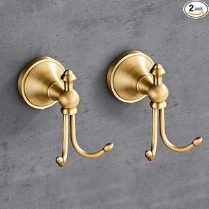 Ganchos de pared de latón duradero, diseñados para resistir el uso frecuente mientras mantienen la apariencia de superficie pulida. - Product Image 4