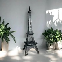Tour Eiffel Paris en métal robuste, parfaite pour les cadeaux de mariage et les décorations vintage, disponible en vrac auprès d'un fournisseur indien.