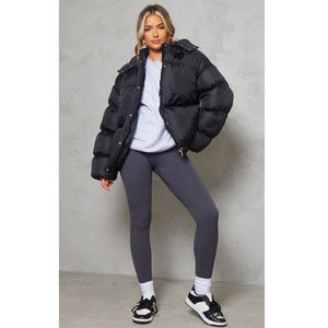 Doudoune imperméable à la mode avec remplissage chaud et capuche réglable pour la protection contre le froid - Product Image 1