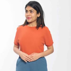 T-shirt décontracté à manches courtes en tricot gaufré orange élégant pour femmes en mélange de polyester léger doux et respirant - Product Image 1