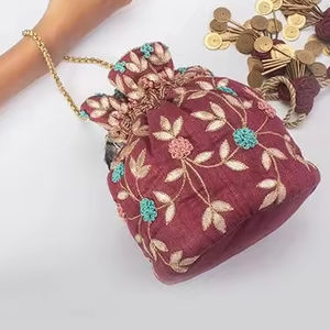 Zari Designer Raw Silk Potli Bags 2024 Ropa de boda/fiesta bordada con cuentas de cristal Resham Work y perlas - Product Image 1