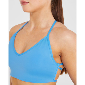 Soutien-gorge de sport à dos croisé bleu d'été personnalisé flatteur décolleté en V à bretelles dans le dos soutien-gorge de sport à impact élevé pour femmes adultes - Product Image 1