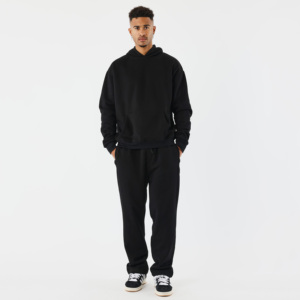 Ensemble sweat-shirt à capuche noir pour homme, pantalon de jogging uni décontracté avec poches latérales et taille élastique - Product Image 1