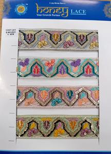 Tela de encaje bordado floral colorida vibrante y detallada con patrones intrincados, perfecta para la moda de alta gama - Product Image 3