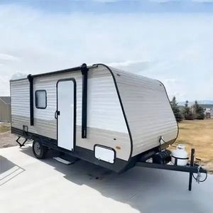 Petite caravane de camping tout-terrain en forme de larme avec tente à vendre et maisons mobiles sur roues. - Product Image 1