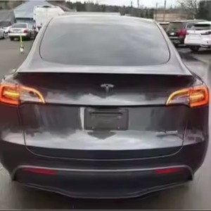 2024 Tesla รุ่น Y ประสิทธิภาพการทำงานไฟฟ้าที่ค่อนข้างใช้ดีกระปุกเกียร์อัตโนมัติทำความสะอาดด้วยเบาะหนังคุณสมบัติแบบพาโนรามา - Product Image 1