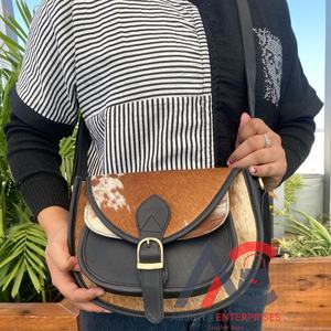 กระเป๋าหนังวัวแบบตะวันตกทรงกลมมีฝาปิดกระเป๋าหนังแท้แบบพรีเมี่ยมกระเป๋าหนังแท้แบบพิเศษสีดำและสีขาวสำหรับผู้หญิง - Product Image 1