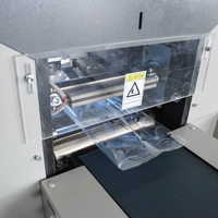 Nouvelle machine d'emballage et d'étiquetage pour sacs/films/pochettes en aluminium pour pain de mie, croissants et autres produits de boulangerie