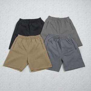 Nuevo estilo de verano para hombres Waffger moda casual deportes al aire libre estilo de playa pantalones cortos con cordón de color sólido - Product Image 1