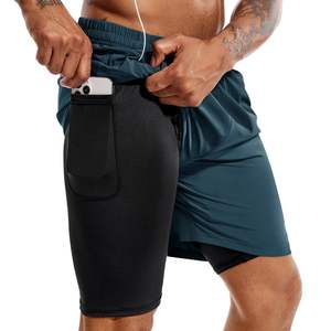 Logotipo personalizado poliéster gimnasio malla de secado rápido deportes atléticos correr deporte Fitness playa transpirable Jogging pantalones cortos sueltos para hombres - Product Image 2