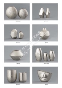 Metal flower vase with detailed floral side artwork for use as a standalone statement piece - Product Image 5