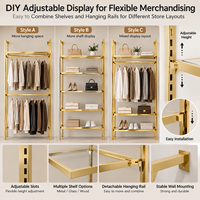Étagères murales de présentation modernes de luxe en gros, système de suspension de vêtements modulaire et réglable, finition or PVD personnalisée