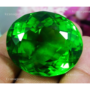 พลอยเพอริดอทสีเขียวธรรมชาติทรงรี น้ำหนัก 155.55 กะรัต คุณภาพระดับ AAA+ ได้รับการรับรอง - Product Image 4