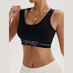 Soutien-gorge de sport yoga personnalisé à maintien élevé pour femme avec logo frontal, coussinets amovibles et design sur mesure - Vêtements de sport en gros - Product Image 1