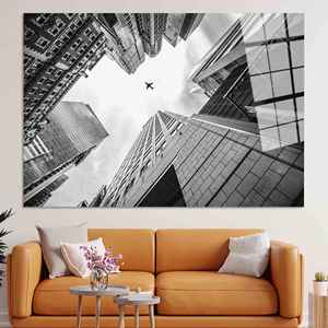 Impresión en lienzo de paisaje urbano: arte moderno en vidrio templado con avión en el cielo, arte en vidrio templado - Product Image 1