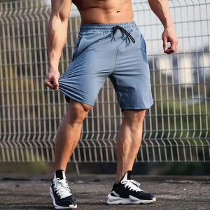 กางเกงขาสั้นลำลองสำหรับผู้ชายกางเกงขาสั้นผ้าฝ้าย100% ไซส์สหรัฐอเมริกามีกระเป๋าสำหรับผู้ชายกางเกงฟิตเนสยิมออกแบบได้ตามต้องการ - Product Image 1