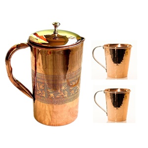 Juego de jarras y vasos de cobre artesanales diseñados para promover una hidratación saludable mientras añaden un encanto elegante a los interiores del hogar. - Product Image 5
