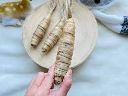 Juguetes de interior al aire libre de Viet Nam, juguetes para masticar con forma de jacinto de agua y zanahoria para conejos, respetuosos con el medio ambiente de Blue Lotus Luc Binh Chew - Product Image 2