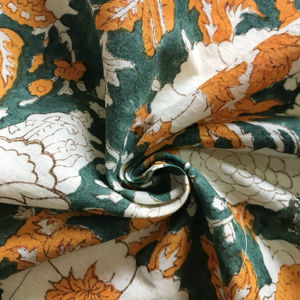 Tela de Algodón Estampada a Mano con Diseño Floral Mughal en Verde y Naranja Mostaza - Product Image 1