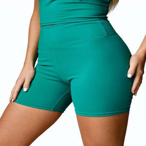 กางเกงขาสั้นออกกำลังกายของผู้หญิงผ้าสแปนเด็กซ์โพลีเอสเตอร์สีทึบระบายอากาศได้มีกระเป๋าใส่ไปยิม - Product Image 1