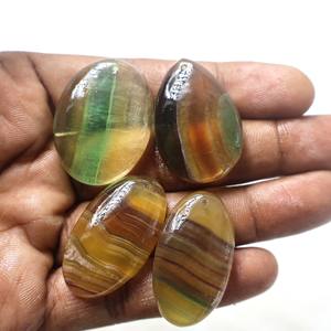 พลอยฟลูออไรต์หลากสีธรรมชาติ คุณภาพพรีเมียม ทรงหลังเบี้ย เรียบเนียน ผ่านการรับรองจากผู้เชี่ยวชาญ สำหรับทำเครื่องประดับ ขนาดอิสระ - Product Image 1