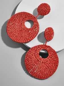 Boucles d'oreilles brodées festival avec fil coloré - Product Image 1