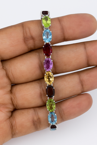 Pulsera de Tenis Ovalada de Plata de Ley Chapada en Rodio con Múltiples Piedras Preciosas Clásicas de Rhaya Jewels - Joyería Unisex para Regalo y Fiesta - Product Image 3